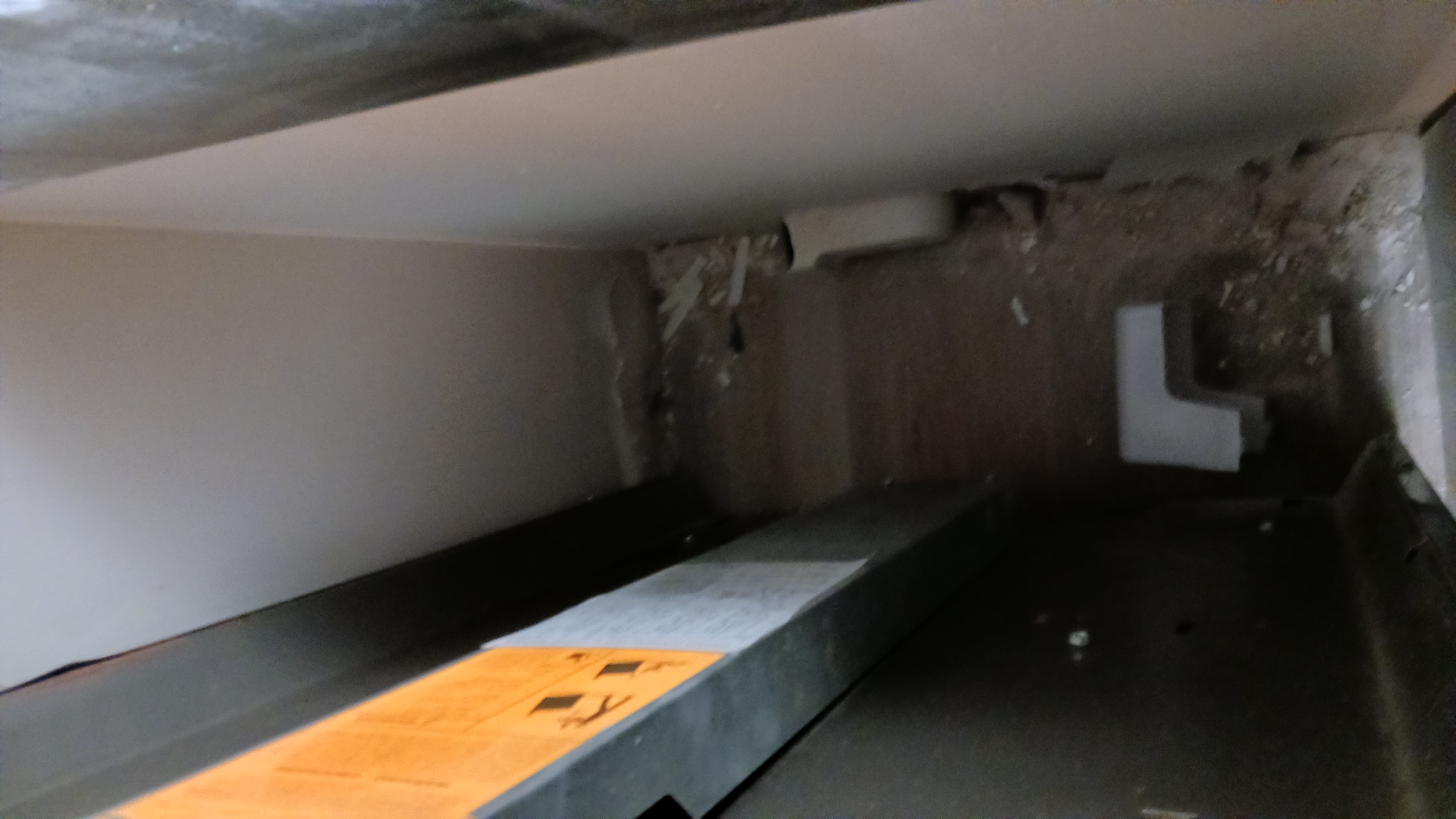 Community Room kitchenette space with debris