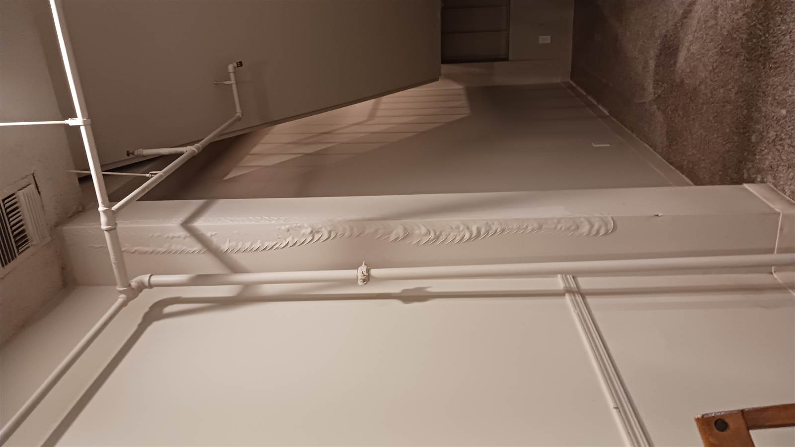 Standing water across the lobby floor